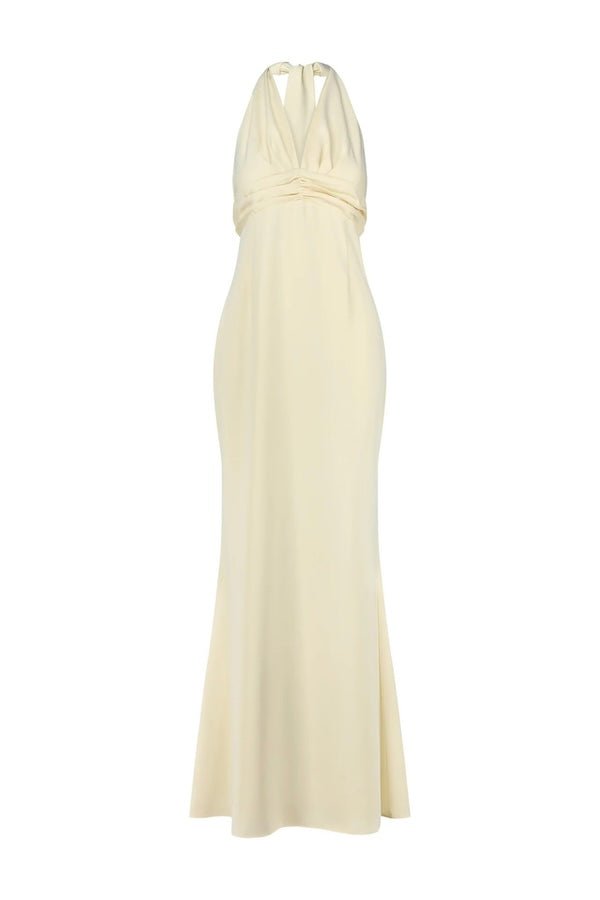 The Ultimate Muse Tie Neck Maxi Dress Butter Cream by Odd Muse – A viral bridal favorite featuring a flattering V-neck, draped shoulders, and elegant low back, perfect for all-night celebrations.