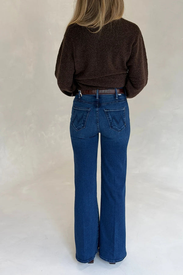 Woman wearing high-rise flared Mother Denim jeans with Renee Leather Belt Chocolate, paired with a textured dark brown sweater.