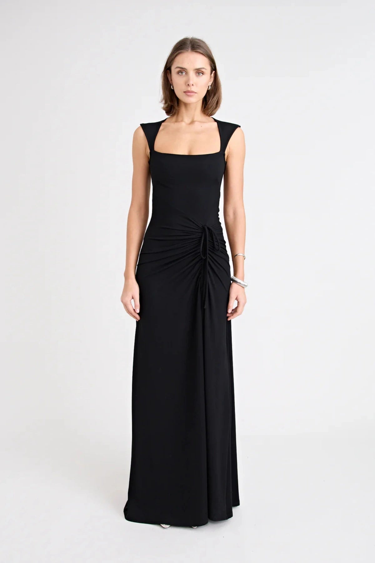 Samara Dress by Pfeiffer — a full-length jersey dress with a square neckline and adjustable front split, perfect for elegant occasions.