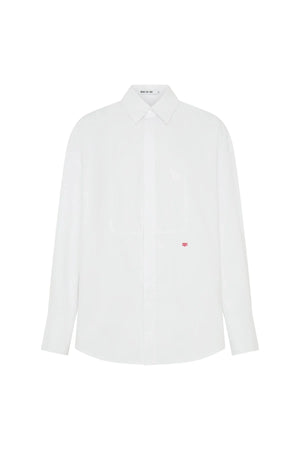 White oversized shirt with long sleeves and a relaxed fit, featuring a classic collar and button-down front.