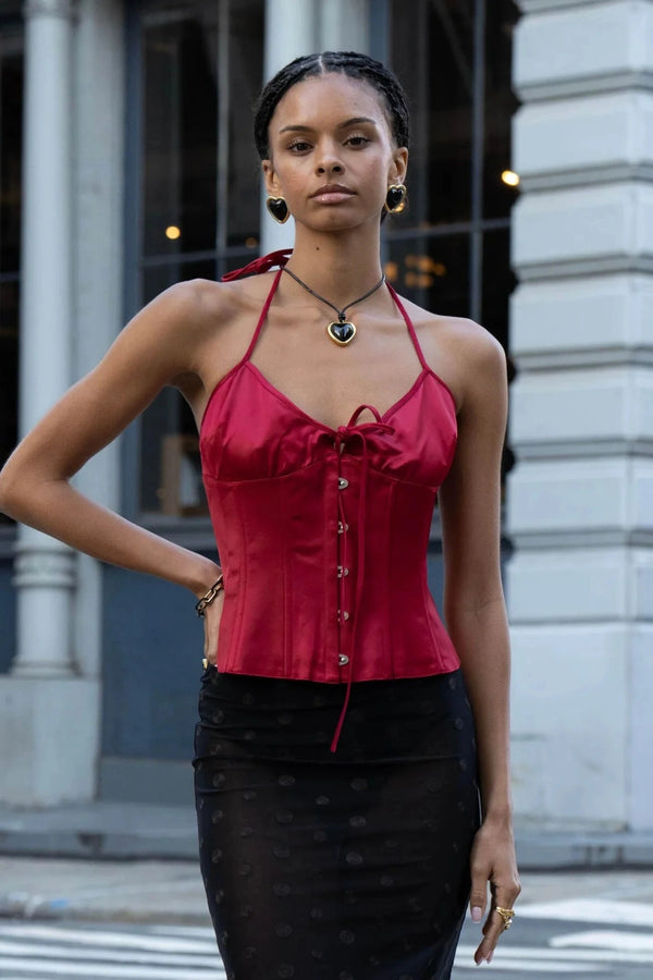 Nightgasm Necklace in Black Glow by Emma Pills, featuring a bold enamel heart pendant on adjustable leather rope. Ideal for standout layering.
