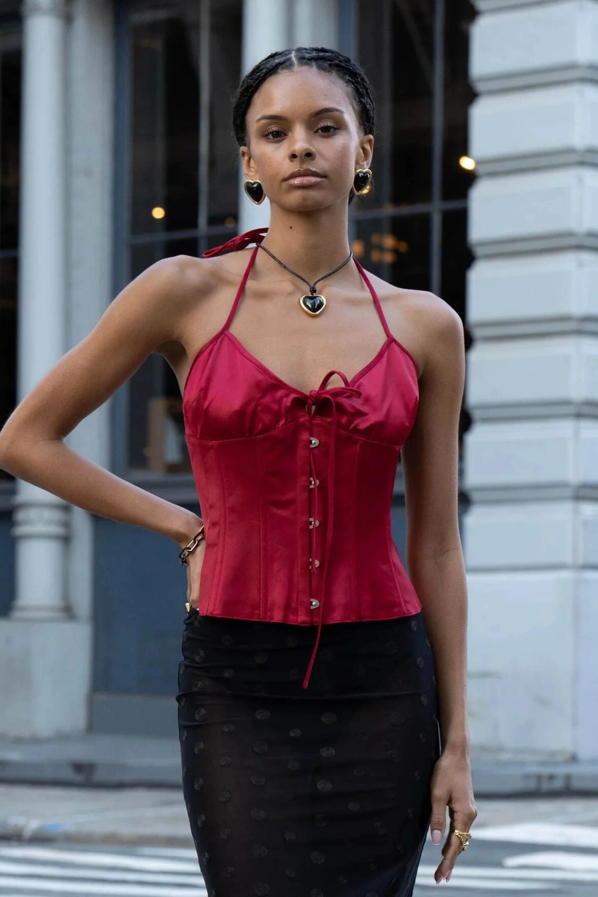 Nightgasm Necklace in Black Glow by Emma Pills, featuring a bold enamel heart pendant on adjustable leather rope. Ideal for standout layering.
