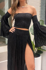 Calypso Skirt Black Gold by D Artemide, maxi skirt with shirred waist and front split. Perfect for beach days or effortless summer looks.