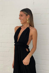 Lefkothea Dress Black by D'Artemide – One-size cotton dress with halter tie, deep V neckline, and sultry back split detail.