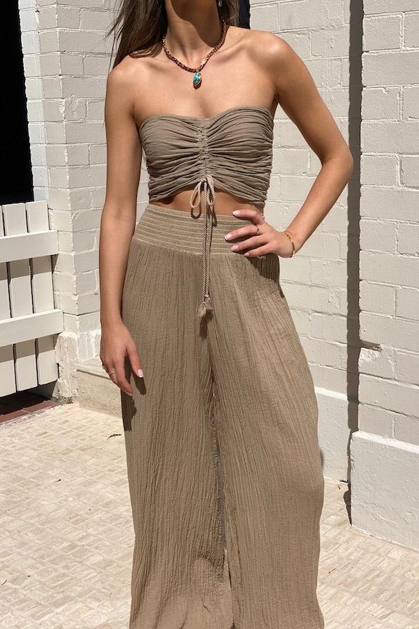 Ruched Tube Top Mocha by D’Artemide, Cotton tube top with ruched back and tie front, perfect for warm-weather layering or resort pairings.