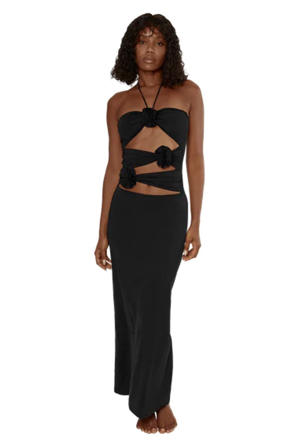 Veranera Dress Black by Maygel Coronel – One-size maxi dress with floral ruffles, knot tie, and cutout waist in sleek black.